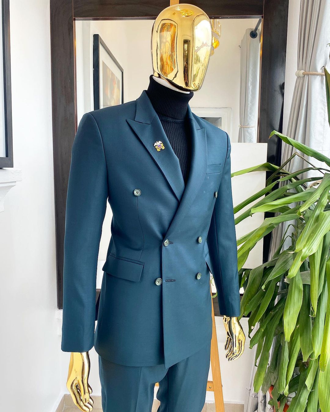 teal double breasted suit